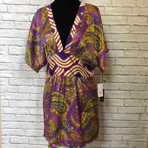 NWT! Notice silk v neck open back tunic size large